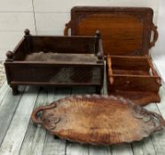 A collection of four hardwood trays and wall hangings
