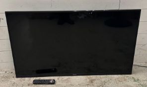 A 50 inch flat screen television by Hisense serial number ENZBO27H