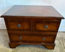 A mahogany veneered media unit with a hinged falling door (H49cm W60cm D48cm)