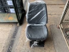 NEW UN ISSUED VEHICLE SUSPENSION SEAT.