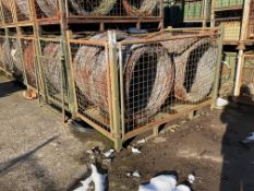 1 STILLAGE OF BRITISH ARMY CONCERTINA GALVANISED RAZOR WIRE IN BUNDLES UNISSUED