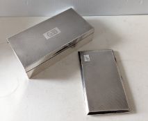 A George V silver cigarette box with engine turned decoration, wood-lined interior by Mappin & Webb