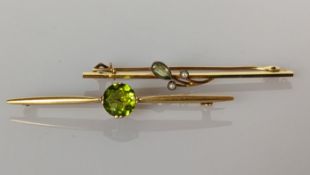A peridot and yellow gold brooch, Egyptian hallmark for 18ct, 53mm