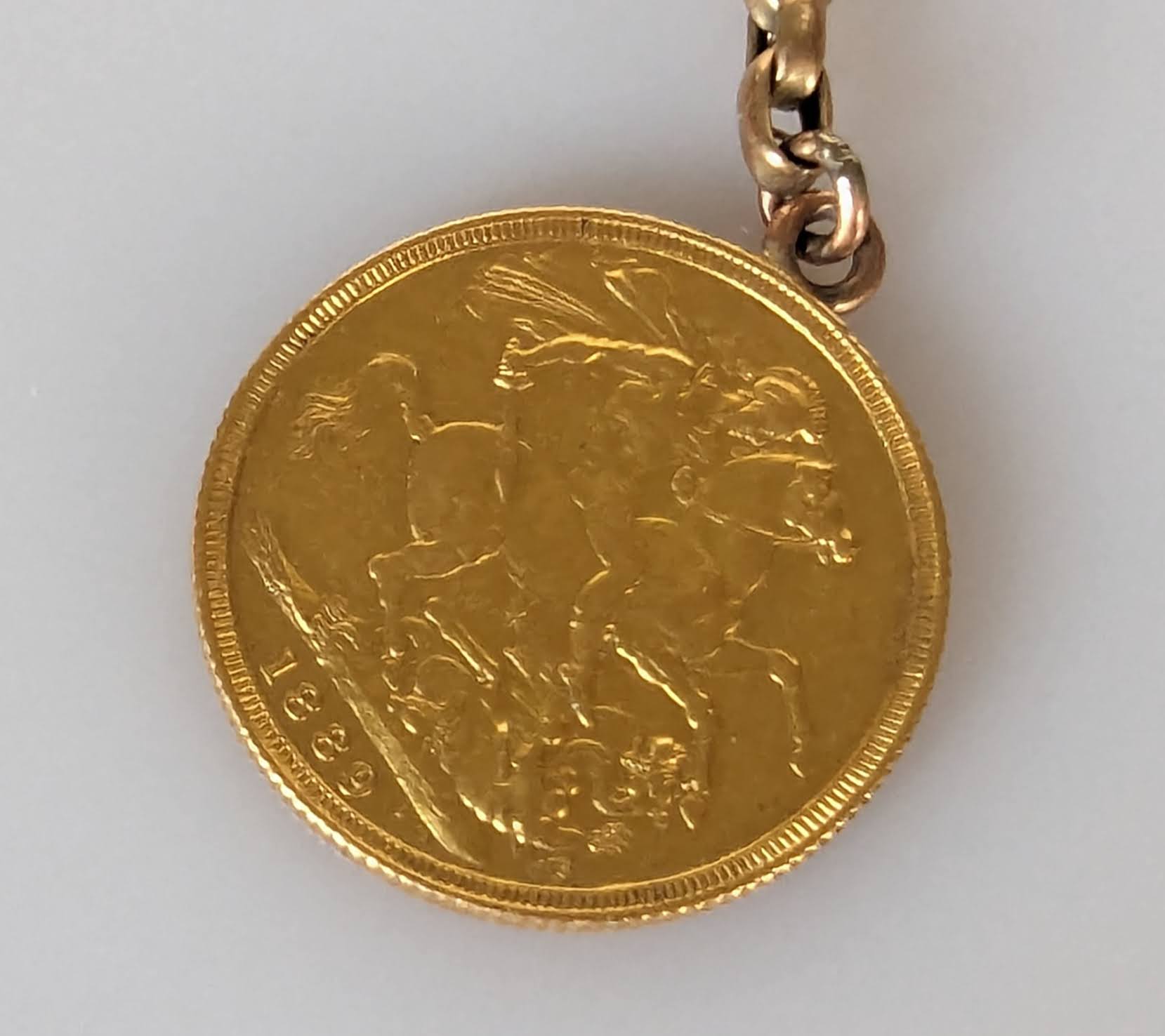 A Victorian gold full sovereign, 1889, mounted on a 9ct rose gold double watch chain with T-bar - Image 3 of 4