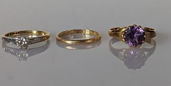 A solitaire diamond ring on a white and yellow gold setting, diamond 0.20 carats