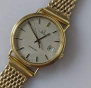 A 1980s Omega Seamaster wristwatch with later gold mesh bracelet strap, champagne dial