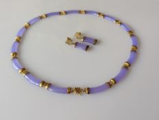 A dyed purple jade panel necklace, with 15 curbed panels and gold coloured chain links