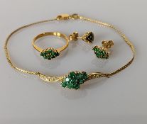 An emerald and yellow gold bracelet, earrings and ring set, stamped 750, 7.8g