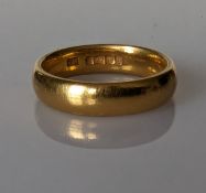 A 22ct yellow gold wedding band, hallmarked, 5mm, 10g
