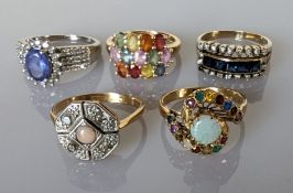 An Art Deco coral and diamond cocktail ring of octagonal form on an 18ct yellow gold and platinum se