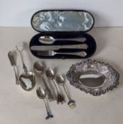 A Victorian cased silver fork/knife/spoon with carved decoration by John Edward Bingham, Sheffield