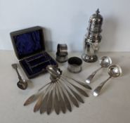 A set of eleven 19th century continental silver spoons, each 14 cm, monogrammed