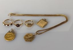A mounted George V gold half sovereign, 1914, 4.4g; two gem-set rings, another signet ring; 