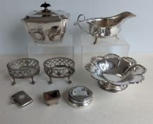A pair of George III silver oval salts with pierced bodies on claw and ball feet