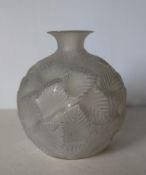 René Lalique (French, 1860-1945), an 'Ormeaux' model no. '984' vase, moulded in relief with leaves
