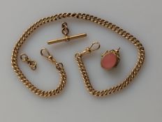 A yellow gold flat curb-link watch chain with twin lobster clasps, T-bar and swivel fob 