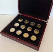 A cased Royal Mint 'The Golden History of Powered Flight' collection of twelve fine silver gilt $25 
