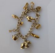 A 9ct yellow gold charm bracelet, all hallmarked, 24.6g