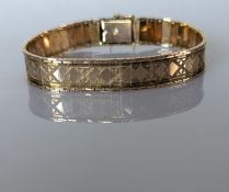 A mid-century fancy-link articulated bracelet, stamped 9ct, 18 cm, 12g
