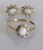 An oval opal cluster ring in a 9ct white and yellow gold claw setting with matching earrings