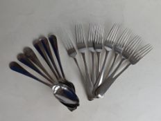 A set of eight 19th century Dutch silver dinner forks, 21 cm,  and six table spoons, 21.5 cm