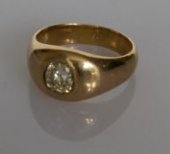 A diamond gypsy ring on a tapering yellow gold shank, the cushion-cut diamond approximately 0.70 ct