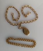 A yellow gold watch chain with double lobster clasps and pendant locket, 37 cm