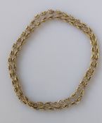A 9ct yellow gold fancy-link neck chain, import hallmarks, 70 cm, 35g