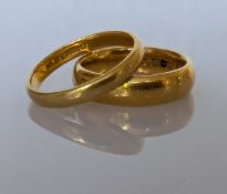 Two 22ct yellow gold wedding bands, 5, 3mm, sizes M, O, 10.9g