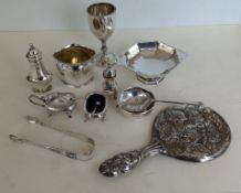 A QEII silver bachelor cruet set with matching tea strainer, hallmarked for Cooper Brothers & Sons 