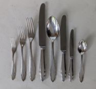 A mid-century German .800 silver 111 piece, twelve-setting cutlery set, the knives with steel blades