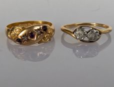 A George V diamond and ruby gold ring with carved decoration and a crossover diamond flower ring