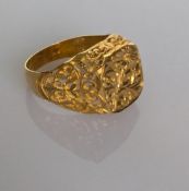 A 22ct yellow gold pierced and etched signet ring, hallmarked for London 1997, maker CM, size U1/2