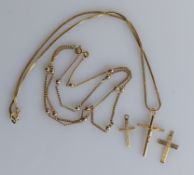 An 18ct yellow gold crucifix pendant chain, hallmarked, 4.6g;  a 9ct yellow gold neck chain 