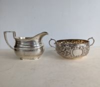 A Victorian silver two handled bowl with embossed rococo decoration, 5 x 11 cm