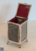 An Edwardian silver mounted playing card holder with hinged lid, lined leather-effect interior,