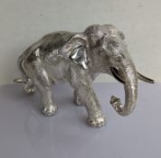 A QEII silver-filled model of an elephant by Camelot Silverware Ltd., Sheffield, 2004, 15 h x 25 w 