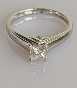 A princess-cut solitaire diamond ring on an 18ct white gold setting, size K, 0.35 carats, colour E, 