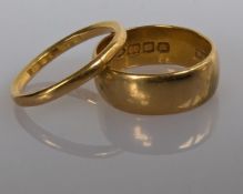 Two 22ct yellow gold wedding bands, hallmarked, sizes , 7.83g