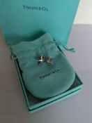 A pair of Tiffany silver starfish stud earrings, stamped Peretti, 16mm, with original packaging