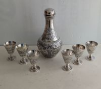 A mid-20th century Indian (probably Bombay) silver srew-top carafe, 23 cm H with six matching goblet