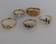 Five 18ct gold rings to include an Art Deco diamond and sapphire ring (one stone missing and cut)