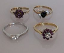 A diamond solitaire ring on an 18ct white gold setting, the round brilliant-cut diamond 