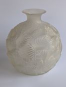 René Lalique (French, 1860-1945), an 'Ormeaux' model no. '984' vase, moulded in relief with leaves