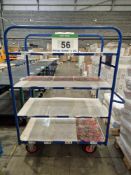 A Blue Steel Framed Trolley, 1.75M tall x 670mm wide x 1240mm long with fitted Four 1240mm x 600mm