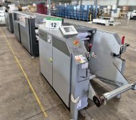 A TECNAU LaserMax Roll Web Fed Cut Sheet Line comprising - One Type LX550 Unwinder, Serial No.