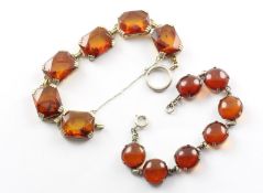 Zwei Armbänder, 925/ooo Silber, Bernstein