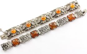 Zwei Armbänder, 800/ooo und 835/ooo Silber, Bernstein