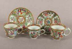 drei Tassen mit zwei Untertassen, famille rose, Kanton-Stil, China, A.20.Jh.