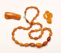 Konvolut Bernsteinschmuck, Kette, Brosche u. Anhänger